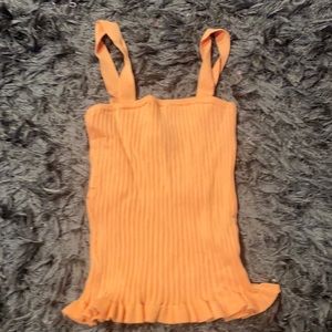 size small from forever 21 ruffles on the bottom peach color